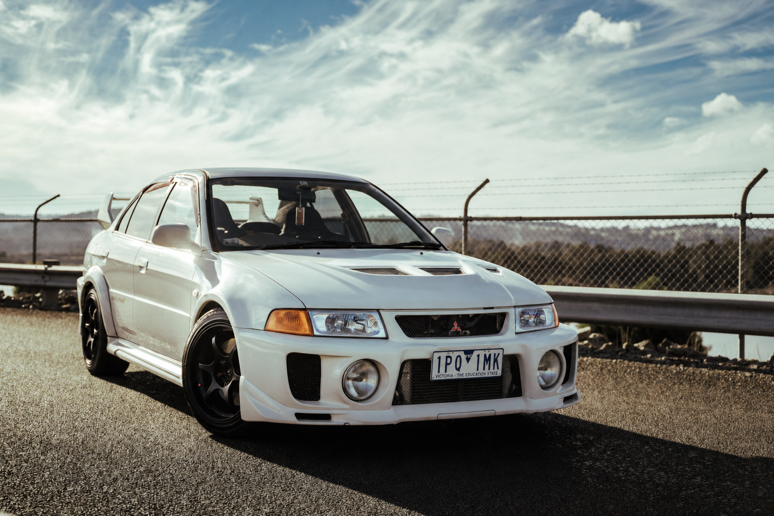 White Mitsubishi Evo - Quality Import